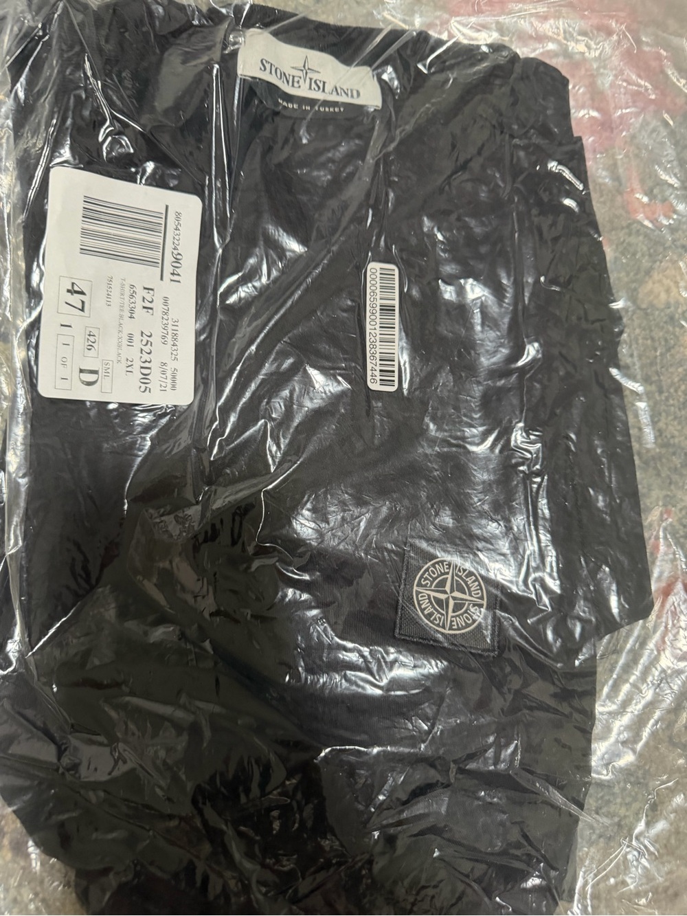 Stone Island Black Tee with Compass Logo Patch on chest